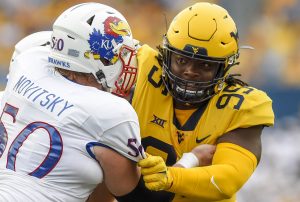 Jalon Daniels, Bryant lead Kansas over WVU 55-42 in OT